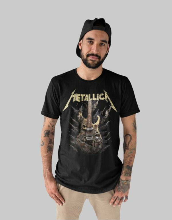 Black Metallica T-Shirt with the band's logo in bold gold letters and a distressed effect, representing the iconic heavy metal band.